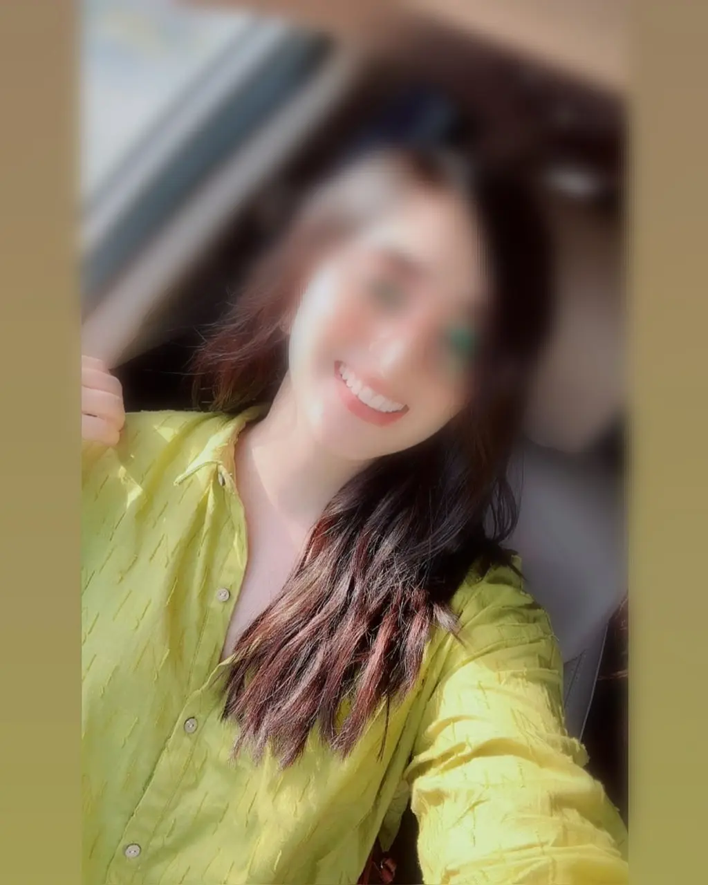 Aditi smiling in a quiet room, the most trusted choice for call girls in Jumeirah 1